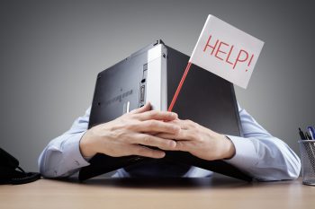 Man with Help sign